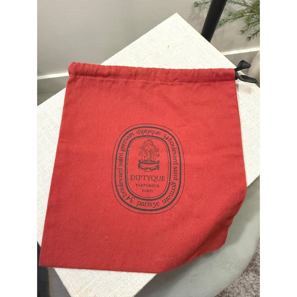 Diptique red gift bag promo candle wrap red and black french luxury wrap glam ec